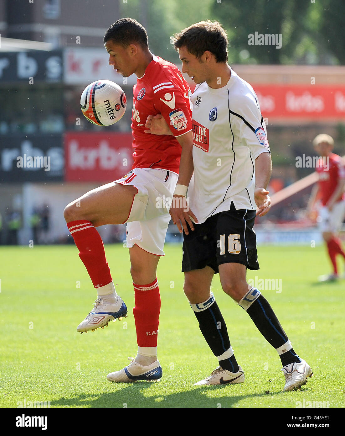Charlton's Nathan Eccleston and Rochdale's Will Atkinson during the npower football league One match at The Valley, London. Stock Photo