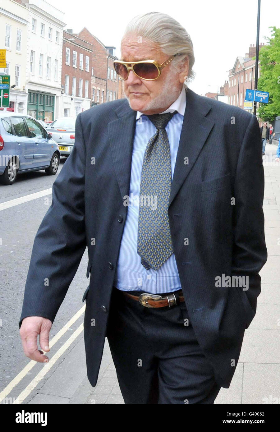 Pop star PJ Proby, real name James Marcus Smith, arrives at Worcester Crown Court where he was due to enter pleas to nine charges relating to claims for pension credit, housing benefit and council tax benefit. Stock Photo