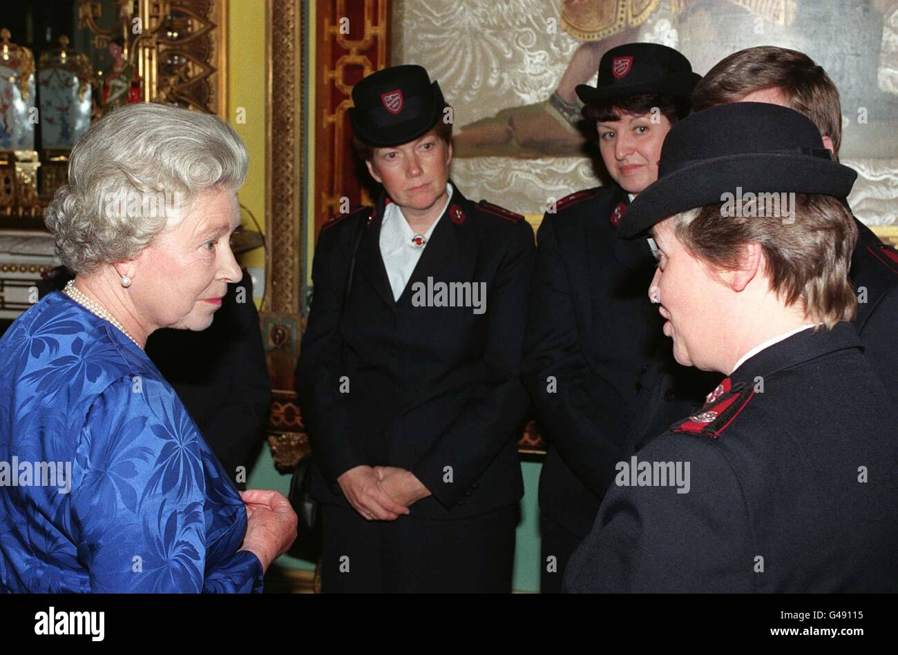 Queen/and salvation army members Stock Photo
