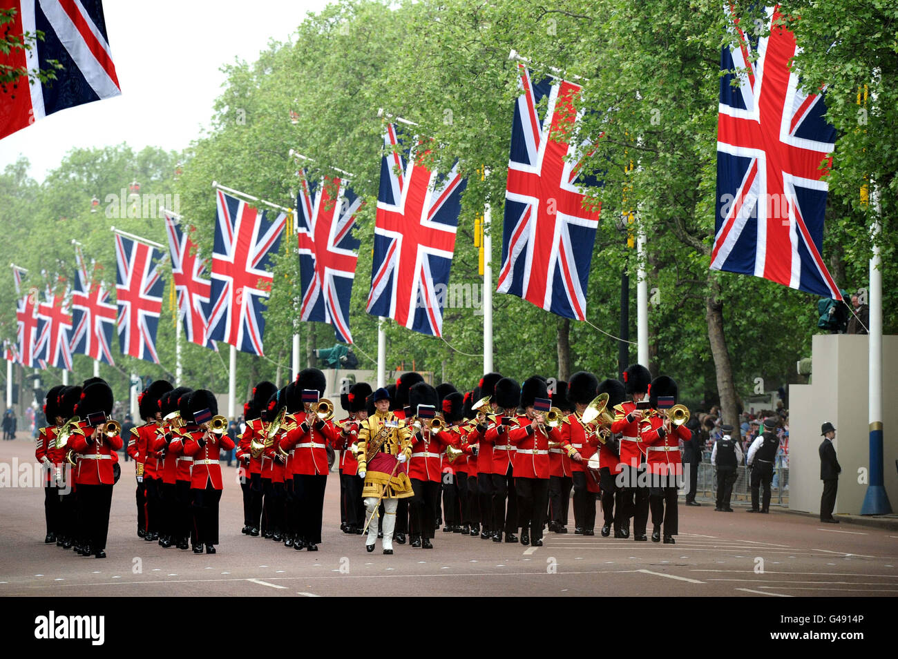 A marching band march up The Mall before the wedding of Prince William and Kate Middleton at Westminster Abbey. Stock Photo