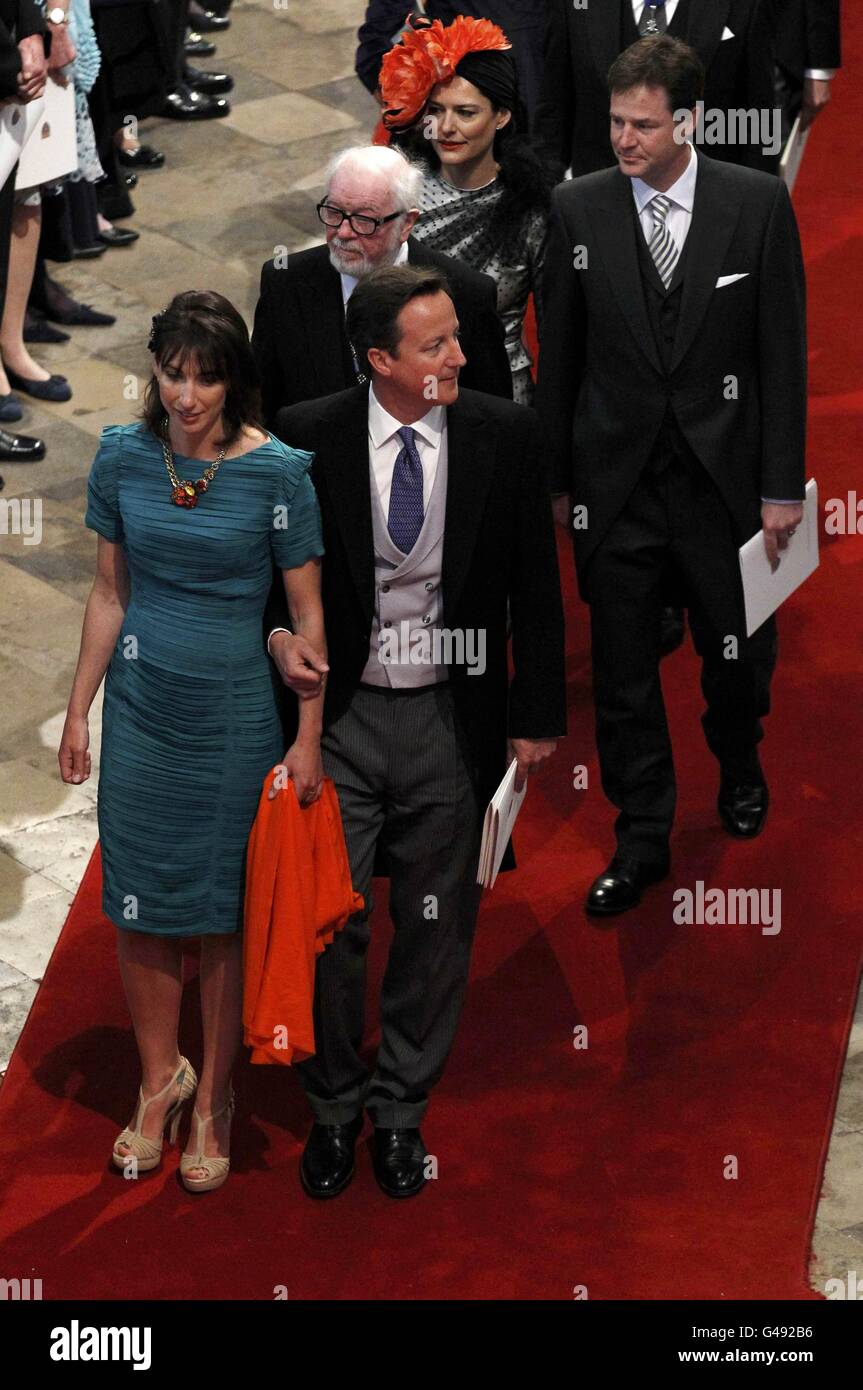Britain's Prime Minister David Cameron (front R) and his wife Samantha (front L) leave with Britain's Deputy Prime Minister Nick Clegg (back R) and his wife Miriam Gonzalez Durantez (back L) the Westminster Abbey after the wedding ceremony of Britain's Prince William and his wife Catherine, Duchess of Cambridge, in central London. Stock Photo