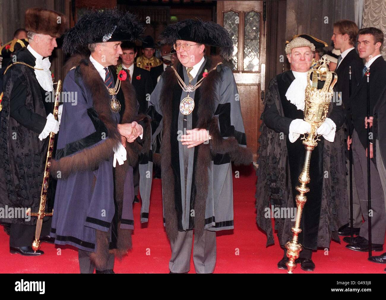 Ex-Lord Mayor of London Sir Roger Cork (2nd left) talks to his successor Alderman Richard Nichols (left) after the post was handed over at a traditional Silent Ceremony in London's Guildhall today (Friday), prior to the Lord Mayor's Show tomorrow. The Lord Mayor has been the elected head of the Corporation of London since 1215. Photograph by Ben Curtis/PA. Stock Photo