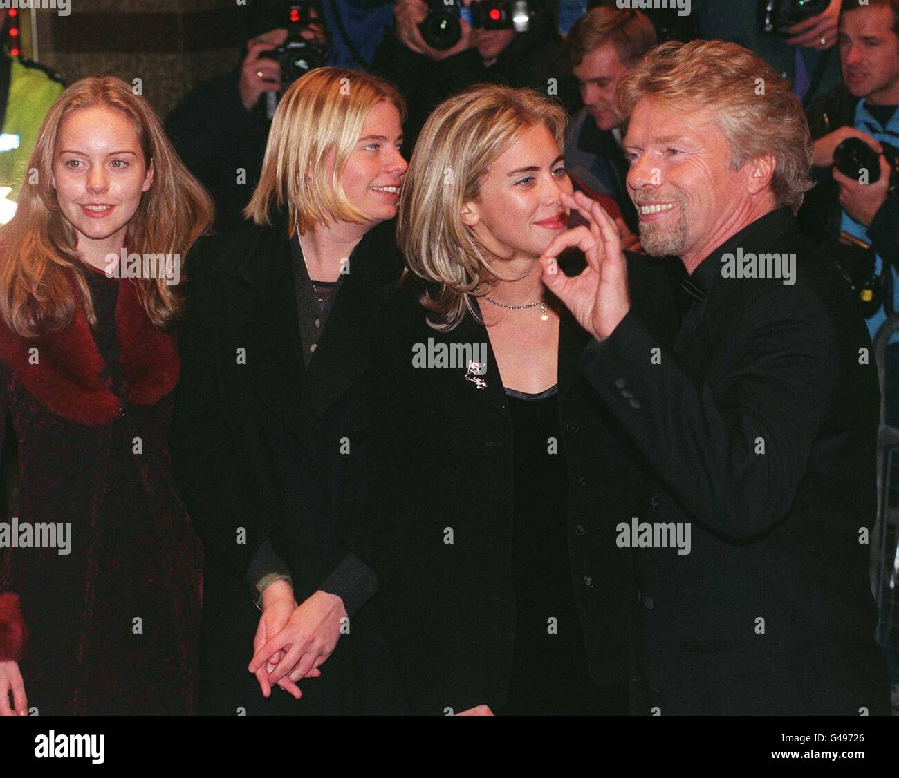 Virgin boss Richard Branson arrives with daughter Holly at the Empire, Leicester Square, for tonight's (Monday) Royal gala premiere of the film Spice - The Movie, which was attended by the Prince of Wales and the young princes Harry and William. Photo by Stefan Rousseau/PA Stock Photo