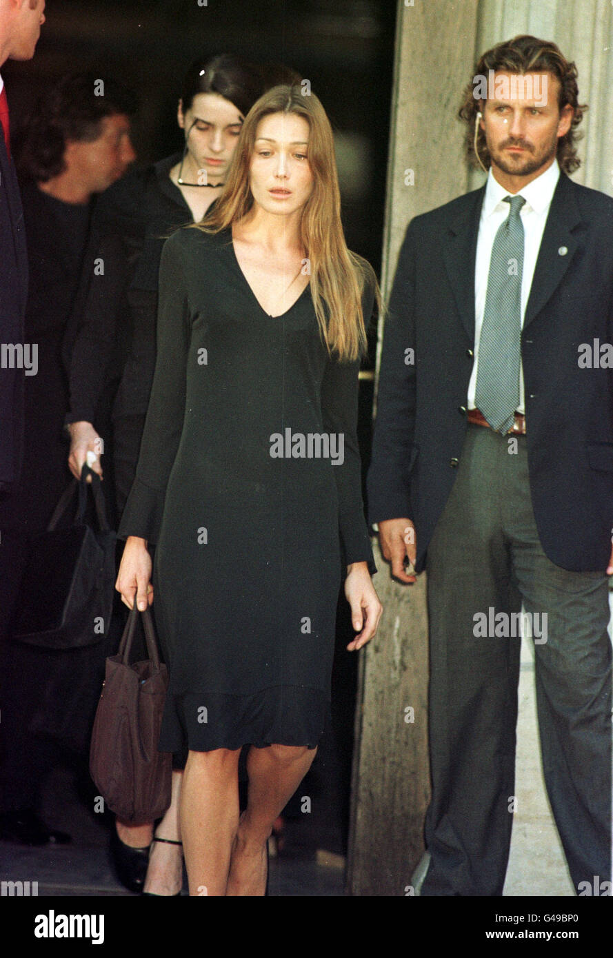 Carla Bruni attends the memorial service held for the designer Gianni Versace who was murdered outside his home in Florida, after being shot in the back of the head. The memorial service was held in Milan, Italy. Stock Photo
