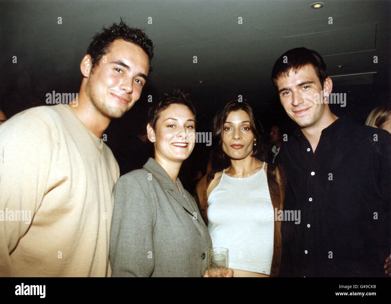 Some of the cast of This Life at the Elle magazine style awards in London . Left to right: Steve John Shepard, Luise Bradshaw, Amita Dhiri and Jack Davenport. Stock Photo