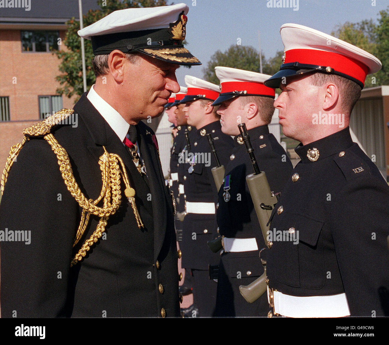 The new Commander in Chief Fleet, Admiral Sir Michael Boyce, inspects a Royal Marine Gaurd of Honour after taking up his new appointment at Northwood today (Wednesday). Mr Boyce suceeds Admiral Sir Peter Abbott, who becomes Vice Chief of the Defence Staff next month. CROWN COPYWRIGHT. Watch for PA Story Stock Photo