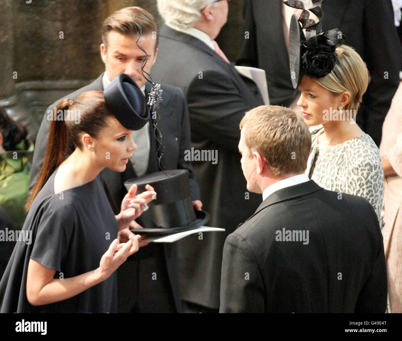 David and Victoria Beckham talk to Guy Ritchie and Isabella Anstruther-Gough-Calthorpe in Westminster Abbey for the wedding of Prince William and Kate Middleton. Stock Photo