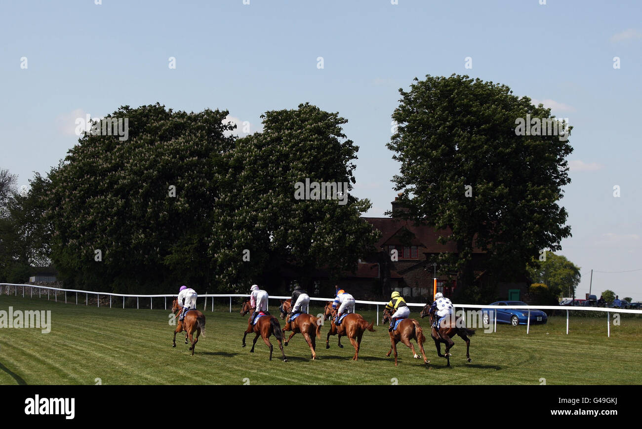 Horse Racing - Bath Racecourse. Runners head off in the Bath Chronicle Selling Stakes at Bath Racecourse. Stock Photo