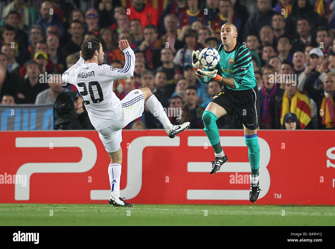 Barcelona Goalkeeper Victor Valdes right Makes A Save From Real barcelona-goalkeeper-victor-valdes-right-makes-a-save-from-real