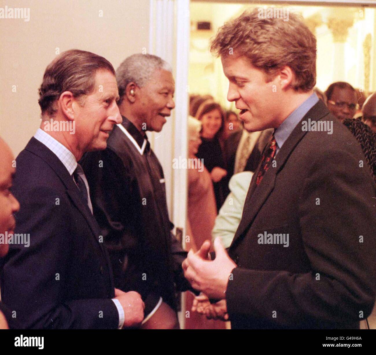 The Prince of Wales (left) talking to the the Princess of Wales's brother, Earl Spencer, following a banquet held in Cape Town , tonight (Tuesday) where the Prince praised the charity work of his ex-wife Diana and spoke of her tragic and untimely death. See PA Story ROYAL Africa. Photo by John Stillwell. POOL PICTURE. Stock Photo