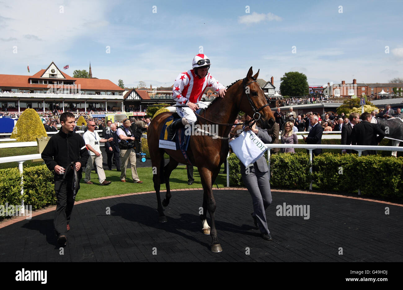 Paul Hangan returns to the winners enclosure on Glen's Diamond after victory in the Addleshaw Goddard Dee Stakes during the Boodles City Day at Chester Racecourse. Stock Photo