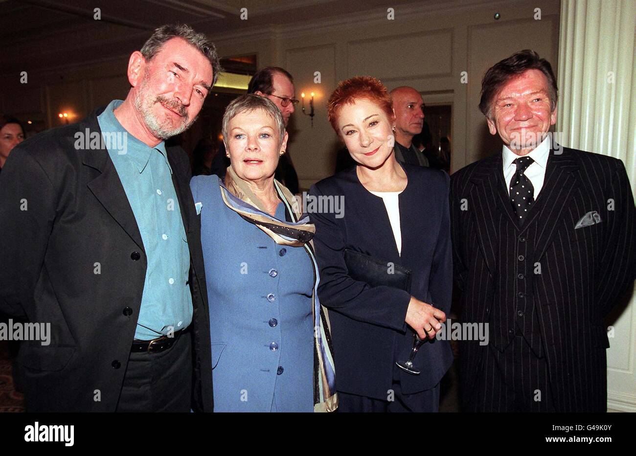 Actors and Actresses Gawn Grainger (left) and wife Zoe Wanamaker (2nd right) with Dame Judi Dench and husband Micael Williams, at today's (Friday) Evening Standards Drama Awards. Dame Judi was awarded the Patricia Rothermere Award for outstanding service. Photo by Fiona Hanson. Stock Photo