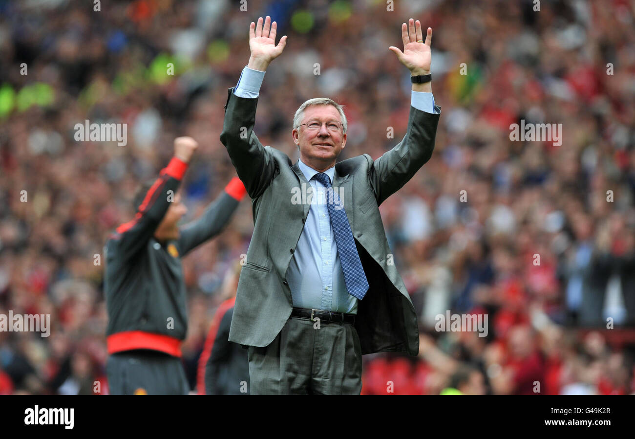 Manchester United manager Sir Alex Ferguson bows to the fans after the final whistle during the Barclays Premier League match at Old Trafford, Manchester. Stock Photo