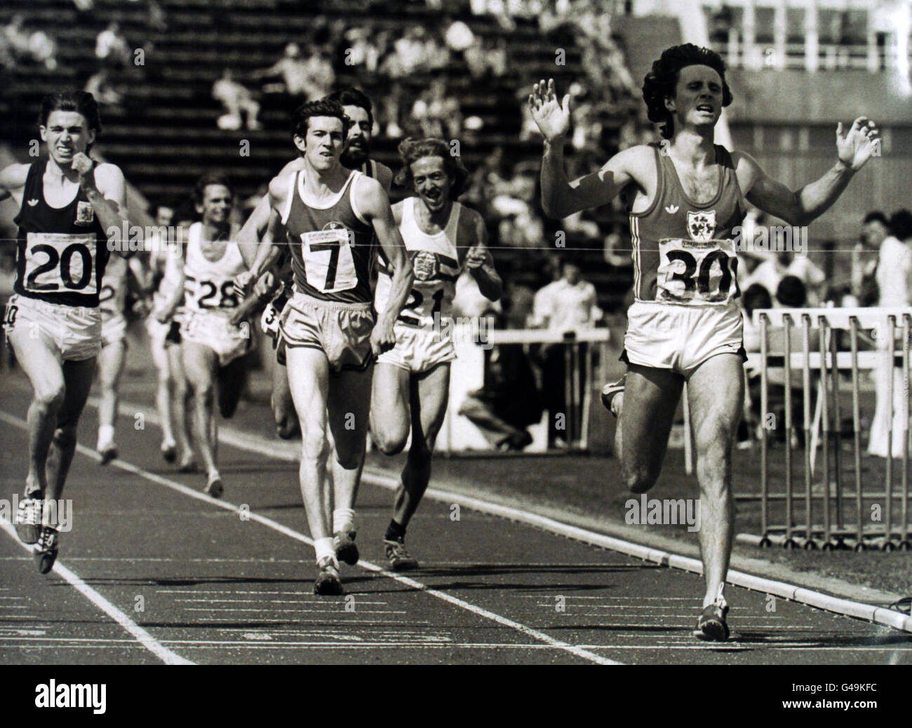 Ireland's Eamonn Coglan wins the 1500 metres final from Glen Grant (7) and Nick Rose (21) Stock Photo