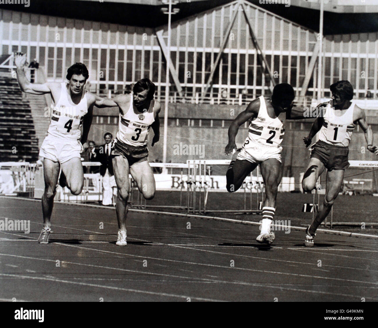 Great Britain's Cameron Sharp (no.4) winning the men's 100m from Anderi Shlyapnikov (no3) and Trevor Hoyte (no.2). Alexander Stasevich (no.1) was fifth Stock Photo