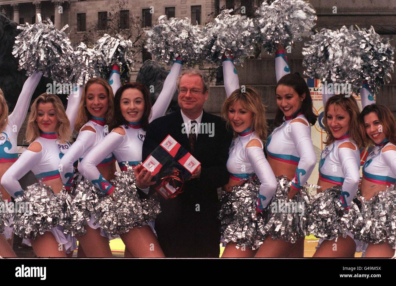 Culture Secretary Chris Smith poses with the top British Cheerleading Squad during a photocall