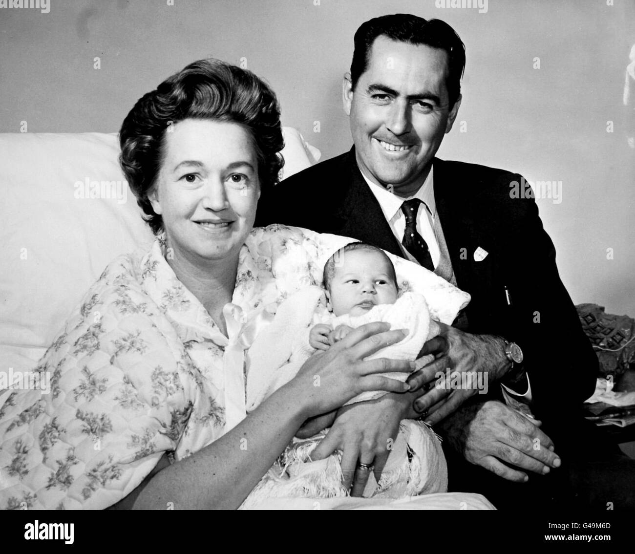 Formula One Motor Racing - Jack Brabham and Family - Wimbledon, London. Betty Brabham, wife of world champion motor racing driver, Jack Brabham, with baby son, Gary Stock Photo