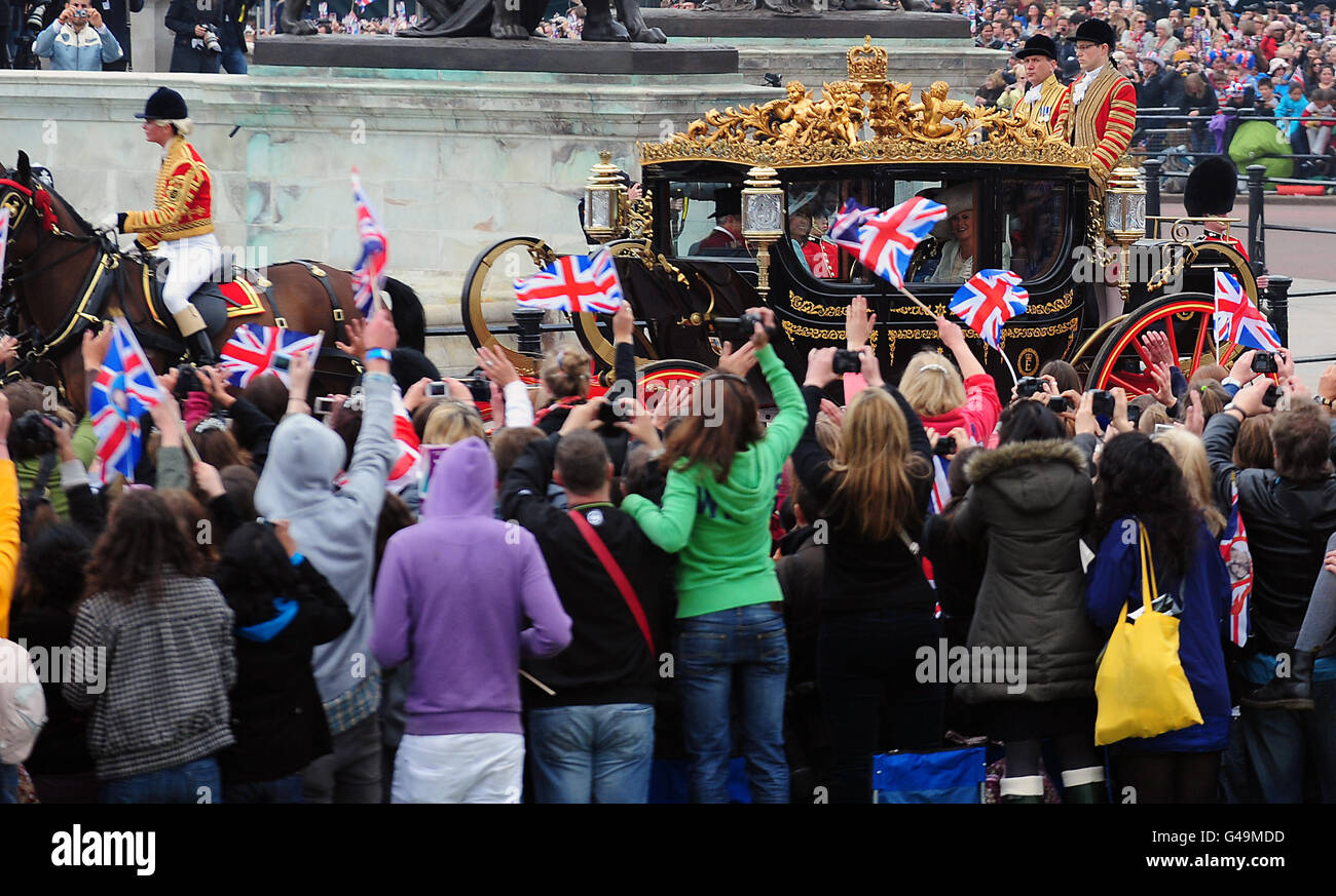 Prince Charles, the Duchess of Cornwall , Carole Middleton and Michael Middleton en-route to Buckingham Palace in a state coach following the wedding of Prince William and Kate at Westminster Abbey Stock Photo