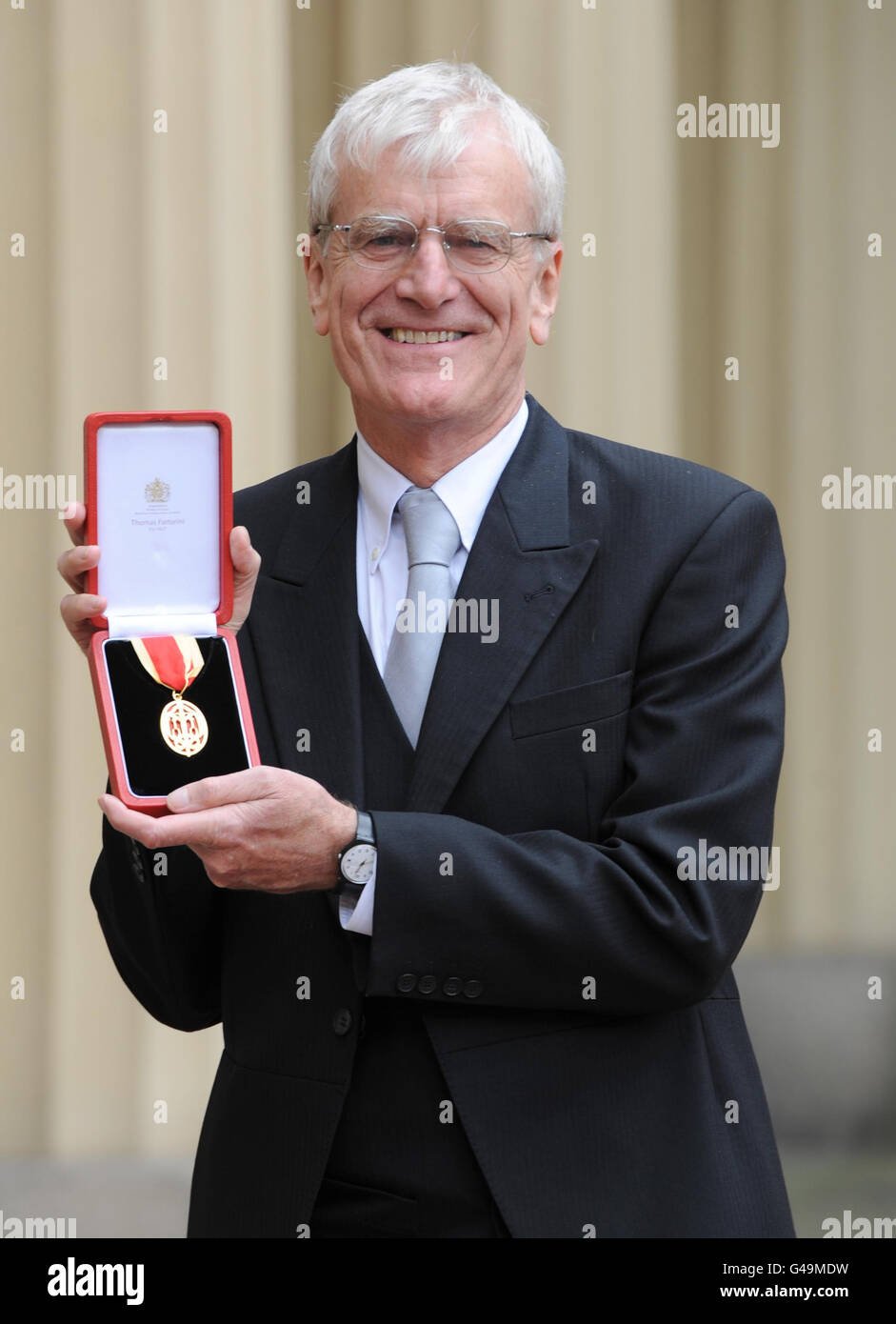 Sir Richard Lambert, Director General of the CBI, poses in the Quadrangle of Buckingham Palace, London after receiving his Knighthood from The Prince of Wales, London. Stock Photo