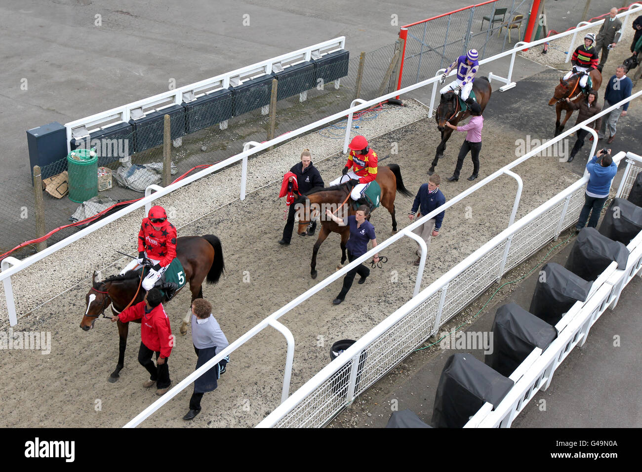 Runners and riders following the Gloucestershire Trainers Championship Novices' Hurdle Stock Photo