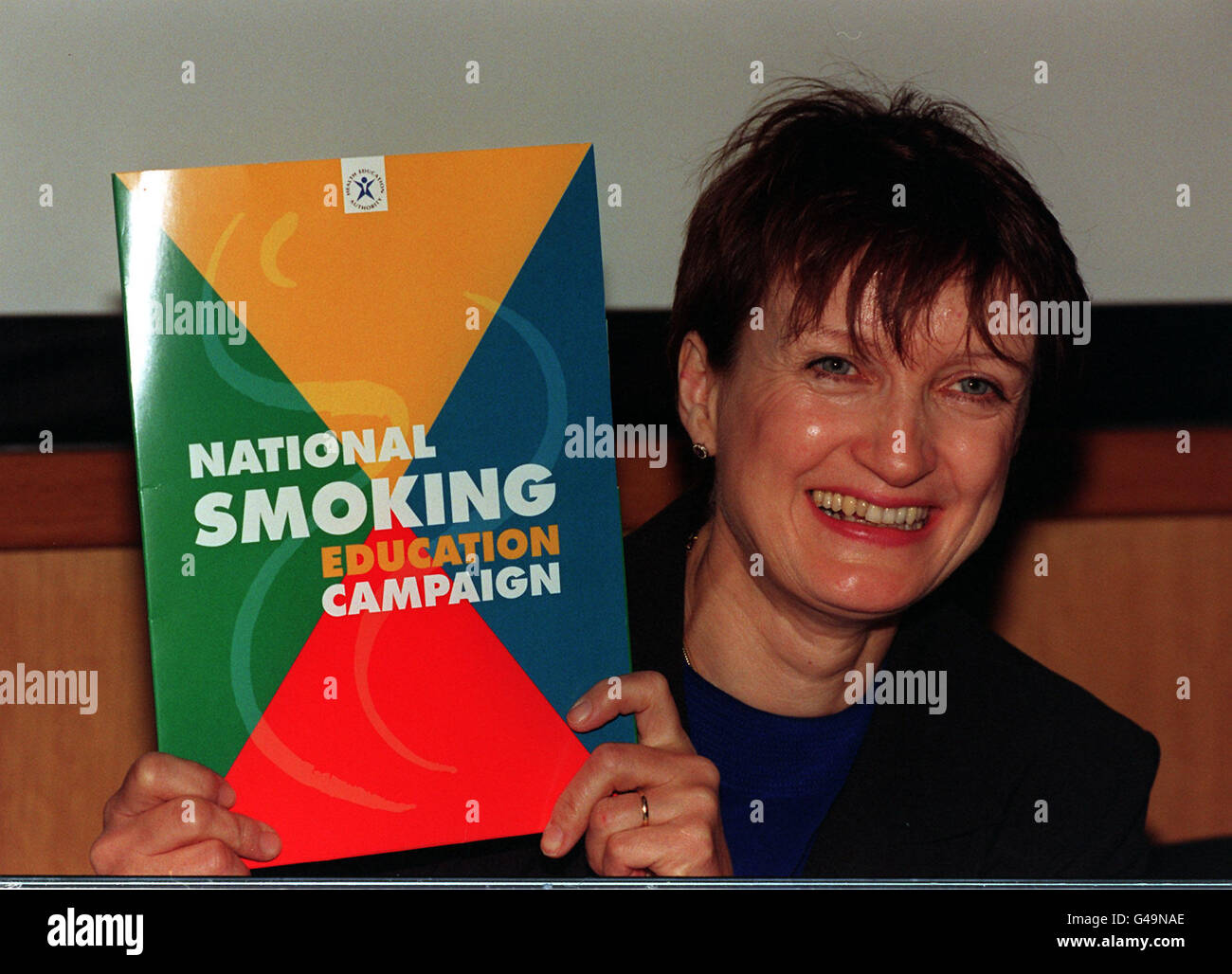 Minister for Public Health, Tessa Jowell, holds up a Health Authority information pamphlet on smoking at the launch of their latest and most hard-hitting anti-smoking campaign at the Royal Brompton Hospital in London today (Tuesday). The 2.5 million TV and radio advertising campaign, which features real people who sufffering from smoking-related diseases, will run from Boxing Day to the end of March in an attempt to stop the increase in the number of young smokers. Watch for PA story. Photo by John Stillwell/PA Stock Photo
