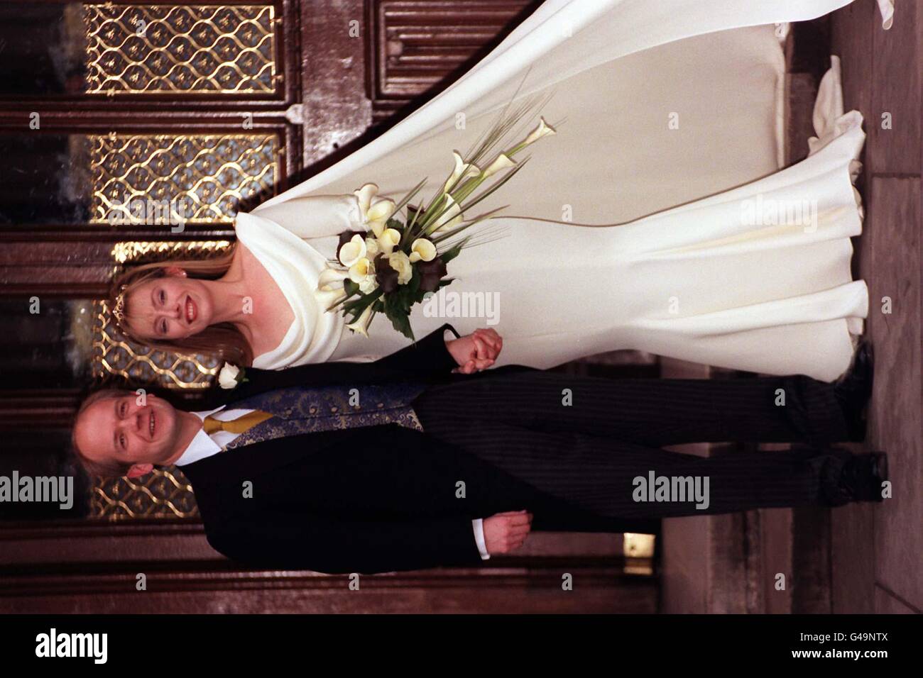 Conservative Party leader William Hague and his new bride, Ffion Jenkins, pose formally for the benefit of the media on the steps of the St Stephens entrance to the House of Commons following their wedding ceremony. * 8/6/01: Hague dramatically announced that he was to quit as Tory leader after his party's heavy election defeat. In a keenly awaited statement outside Conservative Central Office, Hague said he would step down as leader of the party when a successor can be elected. Mr Portillo is likely to be one of the contenders for the position. Stock Photo