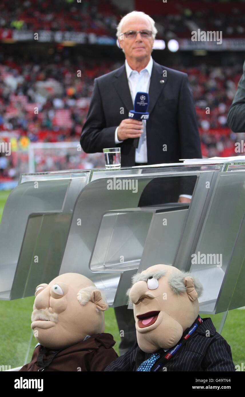 Soccer - UEFA Champions League - Semi Final - Second Leg - Manchester United v FC Schalke 04 - Old Trafford. Commentator Franz Beckenbauer with muppets Statler and Waldorf Stock Photo