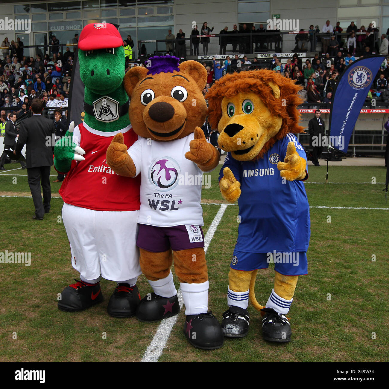 Arsenal mascot Gunnersaurus Rex left and Chelsea mascot Stamford