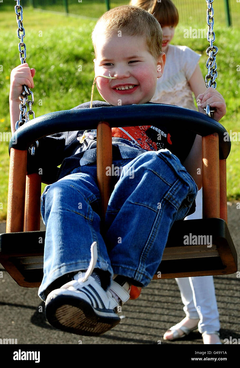 Mason Lewis with sister Indiana at home in Atherstone, Warwickshire. The four-year-old boy has become the smallest person in the UK to have a successful lung transplant. Stock Photo
