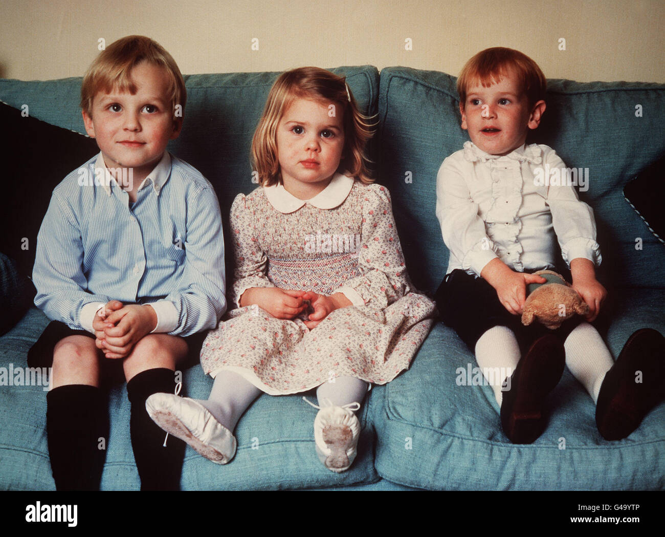 PA NEWS PHOTO 23/4/86 THREE OF THE CHILDREN WHO WILL ATTEND THE BRIDE SARAH FERGUSON WHEN SHE MARRIES PRINCE ANDREW IN WESTMINSTER ABBEY, LONDON ON 23/7/86. (FROM LEFT TO RIGHT) SEAMUS MAKIN FIVE YEAR OLD NEPHEW OF THE BRIDE, SARAH FERGUSON'S HALF SISTER ALICE AND HALF BROTHER ANDREW FERGUSON. Stock Photo