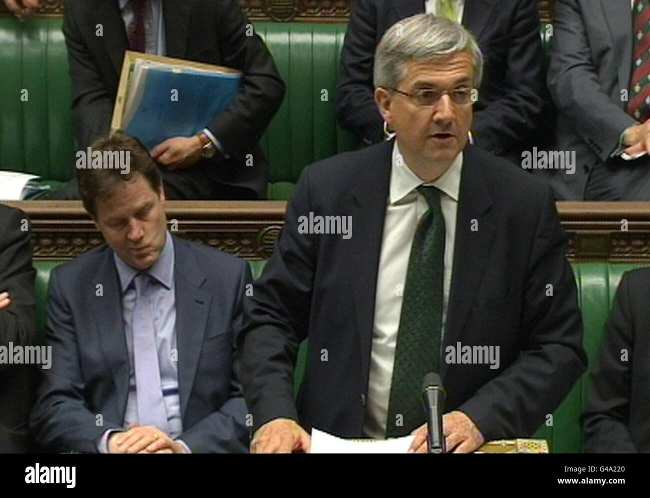 Energy Secretary Chris Huhne speaks in the House of Commons, London, where he announced that the Government will sign up to an 'ambitious' target for the fourth carbon budget that will commit the UK to a 50% cut in emissions on 1990 levels by 2025. Stock Photo