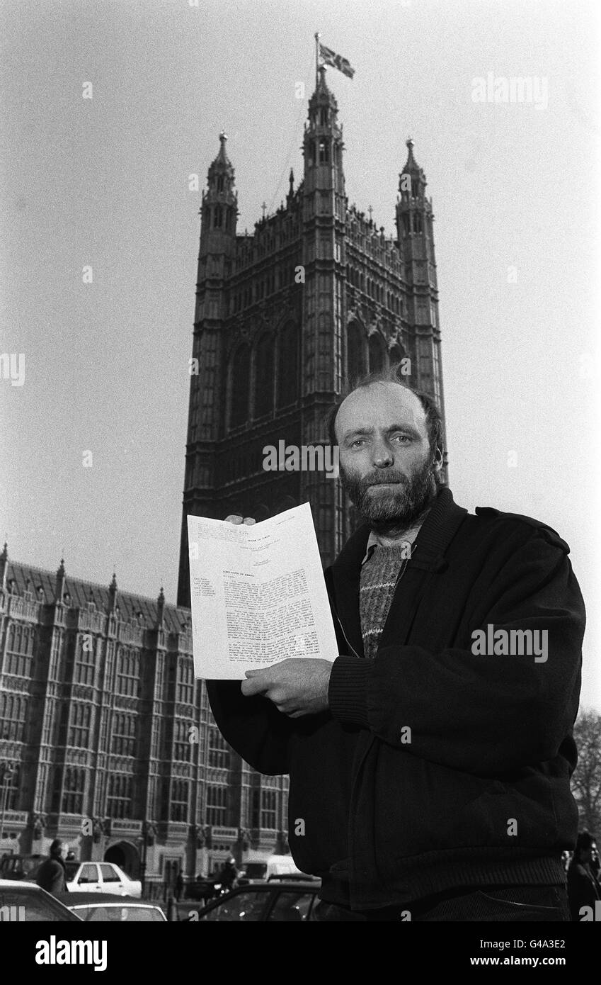 PA NEWS PHOTO 12/3/87 DEPOSED LIVERPOOL CITY COUNCIL LEADER MR. TONY BYRNE AT WESTMINSTER, LONDON WITH THE JUDGEMENT FROM THE HOUSE OF LORDS AFTER 47 COUNCILLORS LOST THEIR LEGAL BATTLE AGAINST DISQUALIFICATION FROM OFFICE AND SURCHARGE Stock Photo