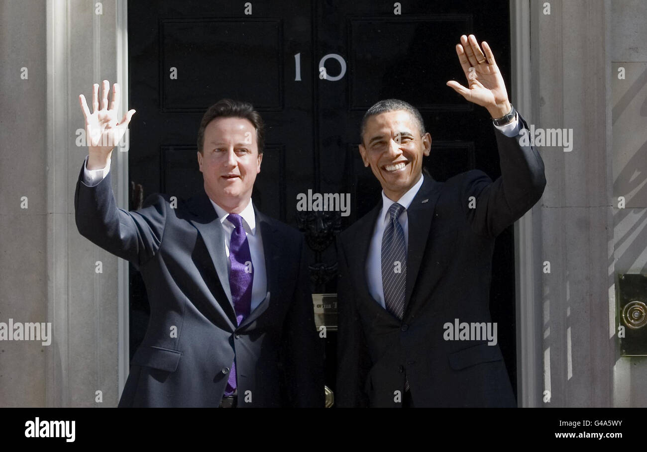 Prime Minister David Cameron greets American President Barack Obama as he arrives in Downing Street, London. Stock Photo