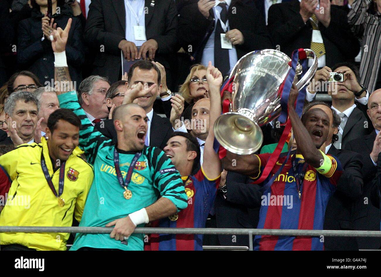 Barcelona players celebrate with the UEFA Champions League Trophy Stock Photo