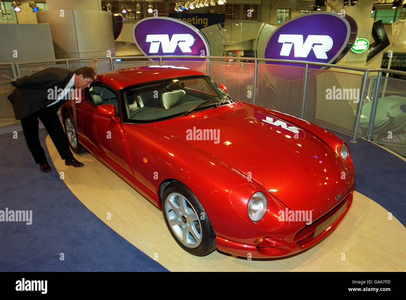 Blackpool-based TVR display their new Cerbera 4.2 litre, two-door fixed top coupe, in brilliant red, at the Earl's Court London Motor Show, today (Tuesday). Photo by Ben Curtis. Stock Photo