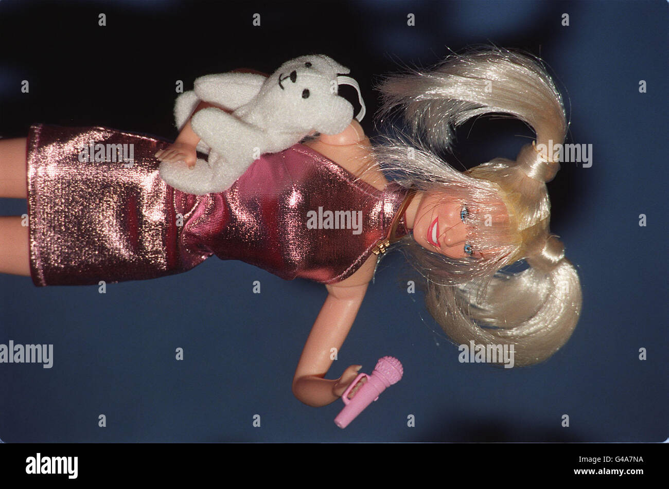 Baby Spice doll, complete with cuddly toy. The long-awaited figurines of all five Spice dolls were revealed in all their glory at a fair of Christmas toys, with as much hype as if the famous five themselves were making an appearance, today (Thursday). Photo by Ben Curtis. Stock Photo