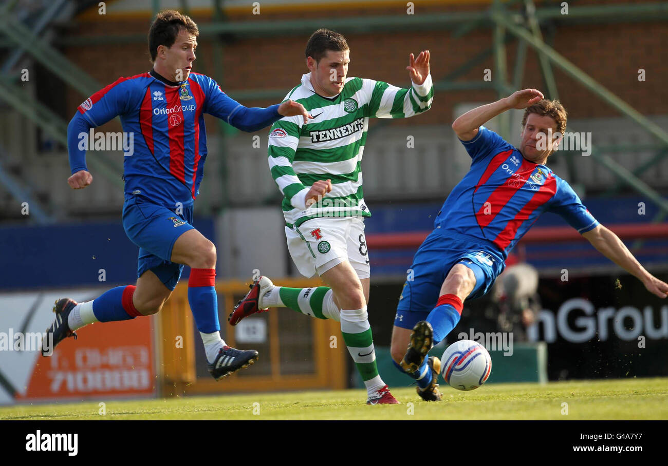 Celtic's Gary Hooper and Inverness's Lee Cox and Chris Innes during the Clydesdale Bank Scottish Premier League match at Tulloch Caledonian Stadium, Inverness. Stock Photo
