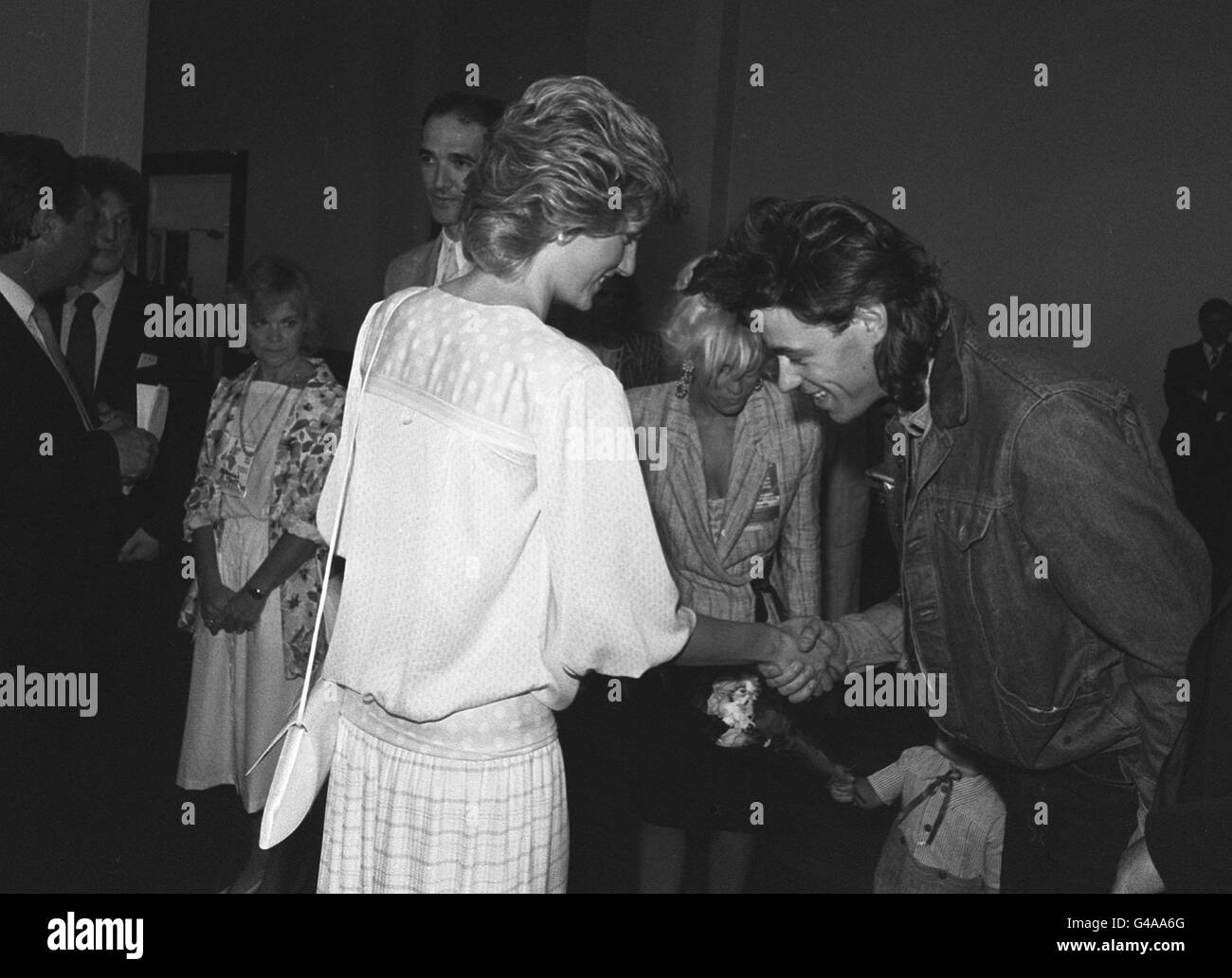 PA NEWS PHOTO 14/7/85 PRINCESS DIANA MEETS BOB GELDOF AT A CHARITY AID CONCERT AT WEMBLEY IN LONDON Stock Photo