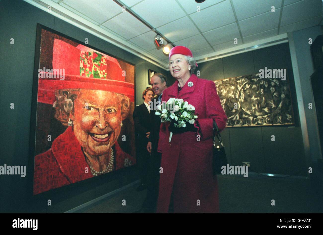 ...TIMES ROTA PICTURE BY SIMON WALKER 27 NOVEMBER 1997 ...HM TheQueen together with HRH The Duke of Edinburgh visiting Radley College , Abingdon , to open a new building. Whilst they were there the Queen started a life size action model called 'Gumby' by pressing a plunger. She was also shown a painting of herself by sixth former Peter Hawkins. Stock Photo