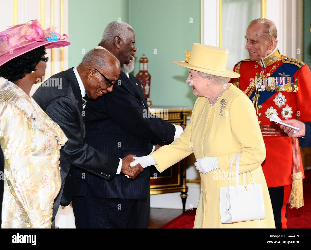 Governor General of Barbadods, Sir Clifford Husbands shakes hands with
