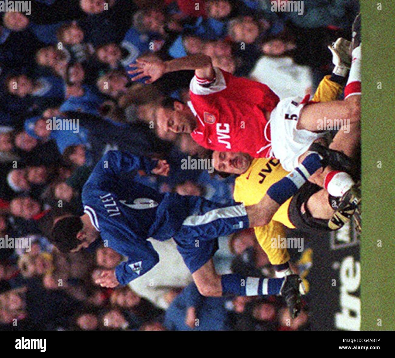 Arsenal goalkeeper David Seaman, well out of his area with his team mate Steve Bould as they try to tackle Leicester City's Muzzy Izzet, which led to Leicester's Neil Lennon being handed a goal on a plate during this afternoon's (Friday) Premiership clast at Highbury. Arsenal defeated Leicester City 2-1. Photo by Tom Hevezi/PA. Stock Photo