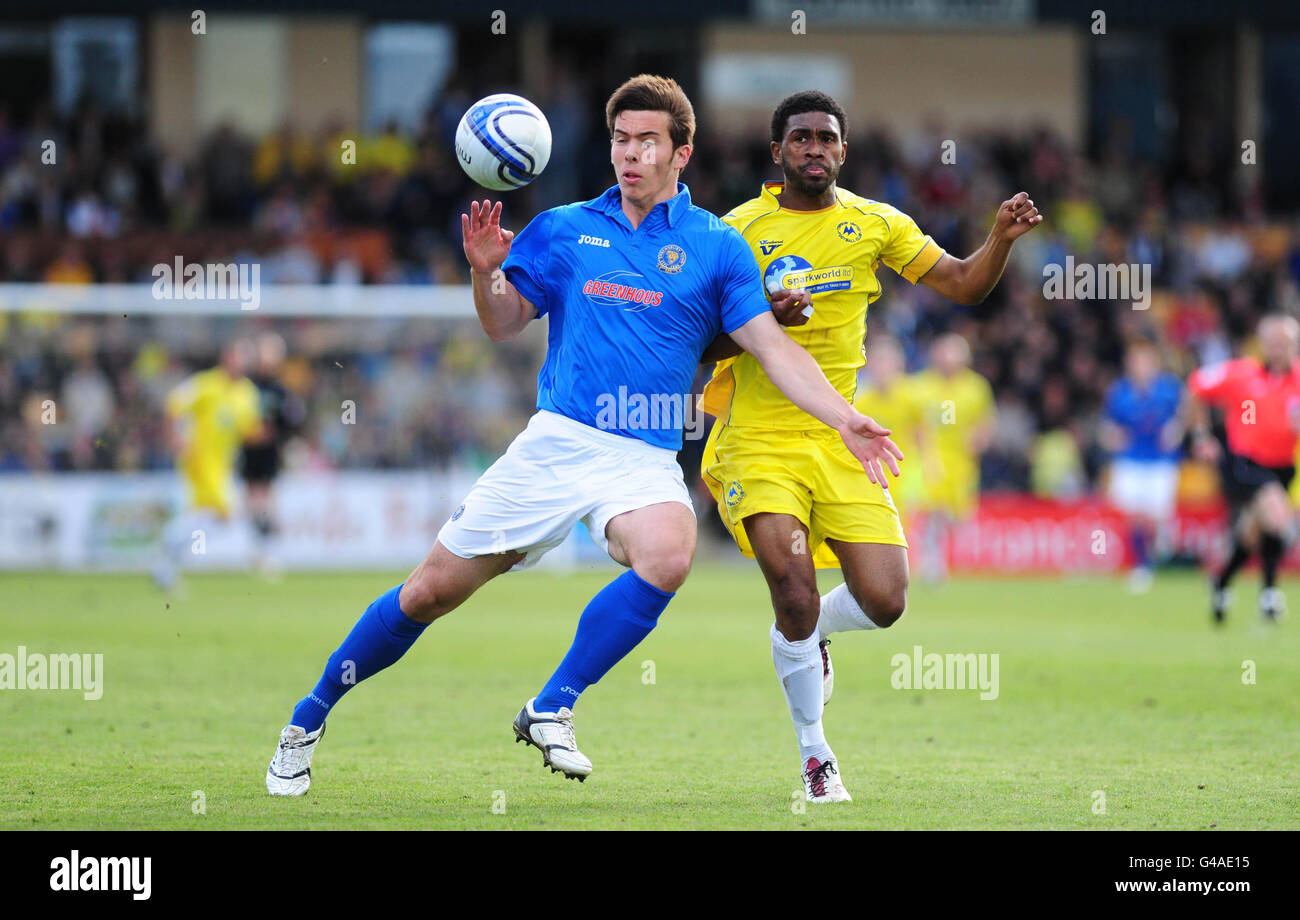 Torquay United's Gavin Tomin and Shrewsbury Town's Niall Canayan in action during the npower Football League Two, Play Off Semi Final, First Leg at Plainmoor, Torquay. Stock Photo