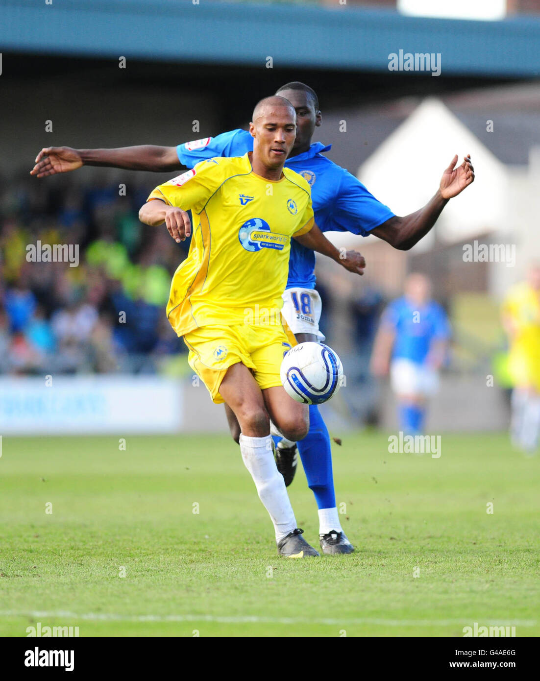 Torquay United's Chris Zebroski and Shrewsbury Town's Jermaine Grandsion in action during the npower Football League Two, Play Off Semi Final, First Leg at Plainmoor, Torquay. Stock Photo