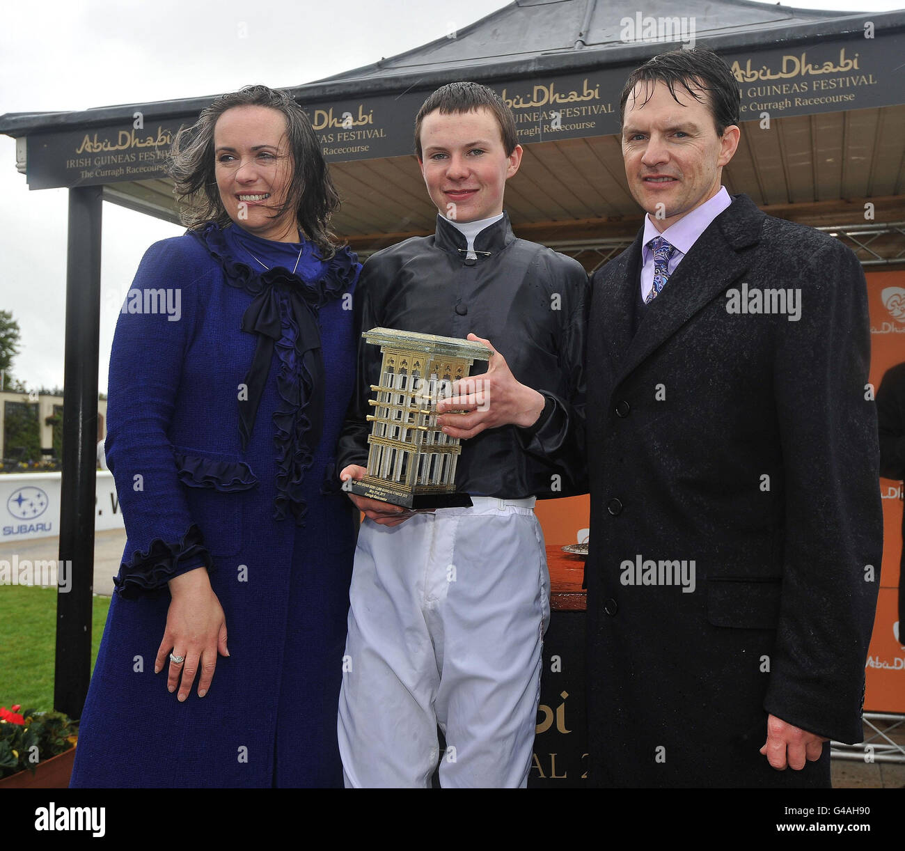 Joseph O'Brien with the winning jockeys trophy and his parents Trainer