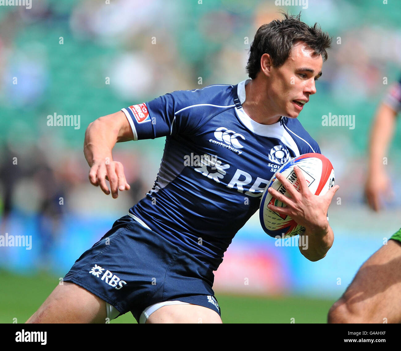 Rugby Union - IRB Emirates Airline London Sevens - Day Two - Twickenham. Scotland's Lee Jones in action during match 26 of the IRB Emirates Airline London Sevens at Twickenham Stadium, London. Stock Photo