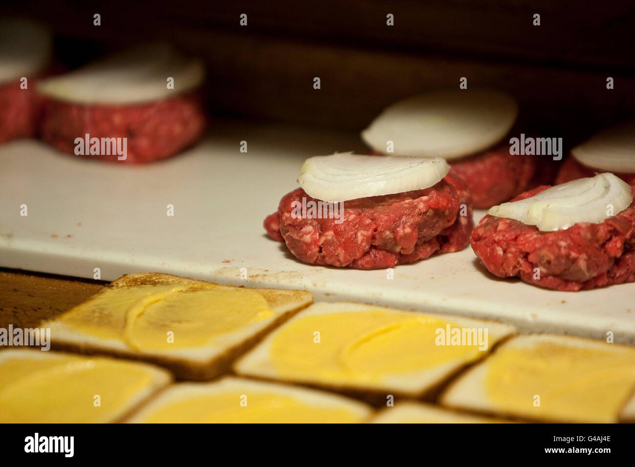 View of hamburgers waiting to be grilled at Louis' Lunch hamburger joint in New Haven, CT, USA, 26 May 2009. Stock Photo