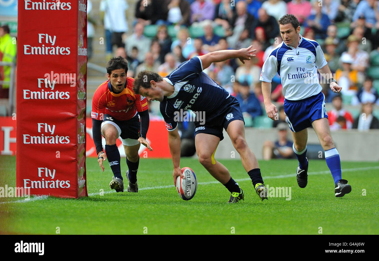 Scotland's Peter Horne scores a try during match 35 against Spain of the IRB Emirates Airline London Sevens at Twickenham Stadium, London. Stock Photo