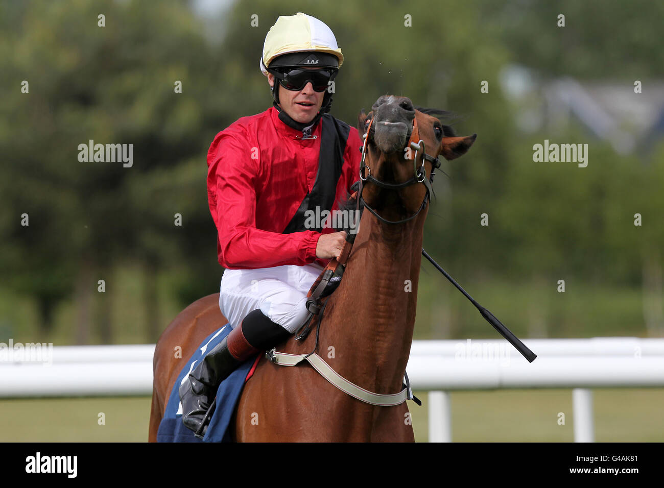 Jockey Richard Hughes on Best Terms after winning the Scope Charity Fillies' Conditions Stakes Stock Photo