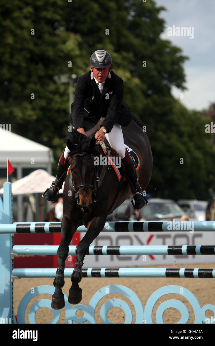 Tim Stockdale riding Fresh Direct Kalico Bay competes in a jumping competition during day three of the Royal Windsor Horse Show at The Royal Mews, Windsor Castle, London. Stock Photo