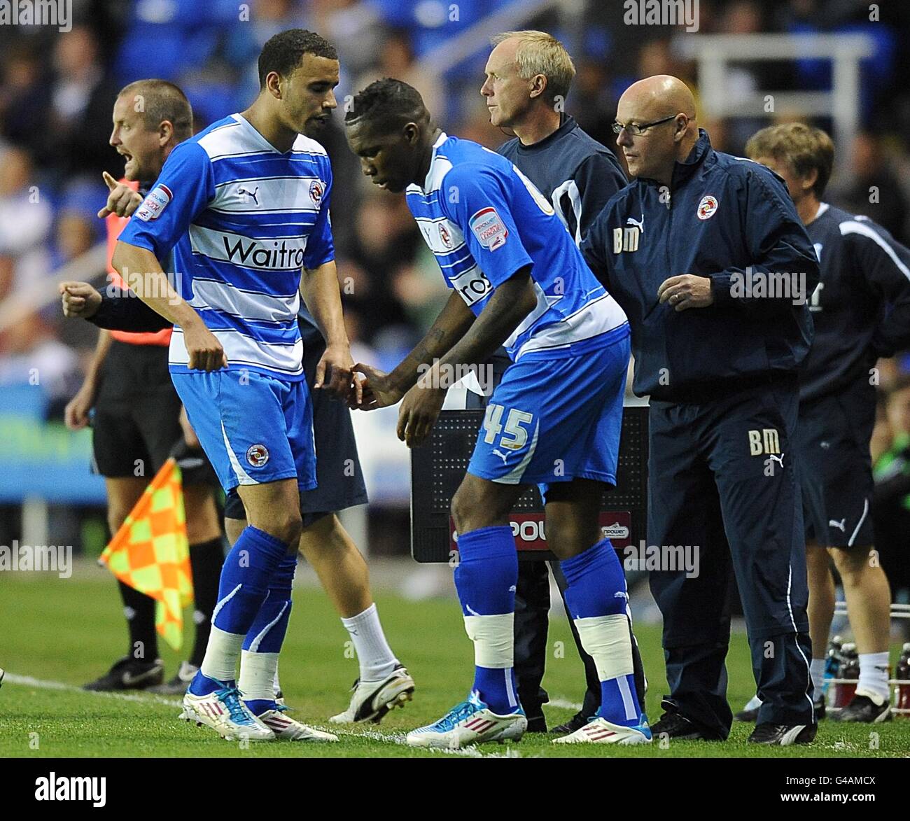 Reading S Hal Robson Kanu Left Is Replaced By Team Mate Mathieu Manset Centre After Picking Up An Injury As Manager Brian Mcdermott Right Looks On Stock Photo Alamy